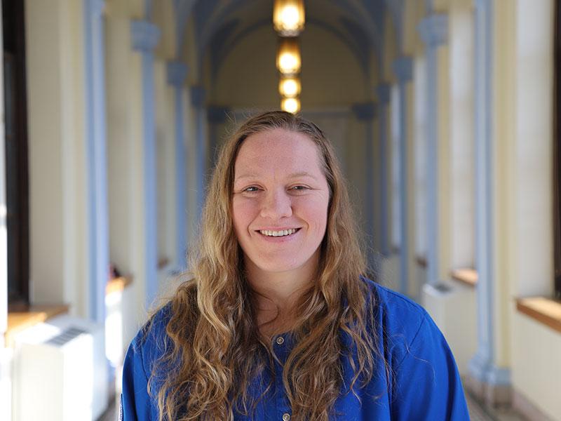 Woman in university hallway